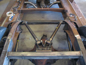 3 of the top 4 link brackets cut out and tacked to the axle and frame